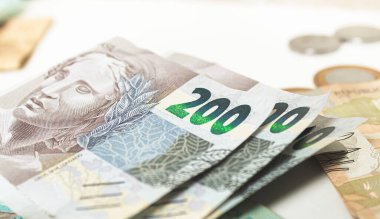Real, money from Brazil. Dinheiro, Reais, Real Brasileiro, Brasil. Brazilian banknotes in close-up.  brazilian banknotes of 200 Reais  
