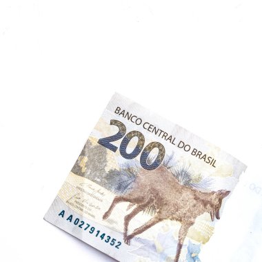 Real currency, money from Brazil. Money, Brazil, Real, Brazilian Real. A banknote of 200 reais in close-up and isolated on white.