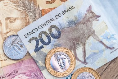 Real currency ( BRL ), money from Brazil. Dinheiro, Reais, Real Brasileiro, Brasil. A group of brazilian banknotes in close up.
