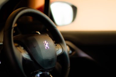 Brazil, Federal District - Brazil. Feb. 13, 2019. Vehicle interior. Photo Peugeot 208 steering wheel.