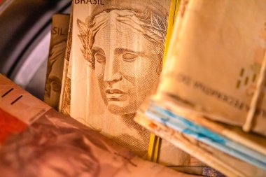 Brazilian Real banknotes in close-up photography. Brazilian economy and finance.