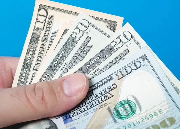 Man Hand Holding Usa Dollar Banknotes Blue Background — Foto de Stock