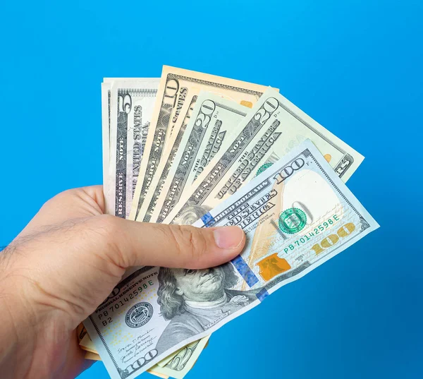 Man Hand Holding Usa Dollar Banknotes Blue Background — Foto de Stock