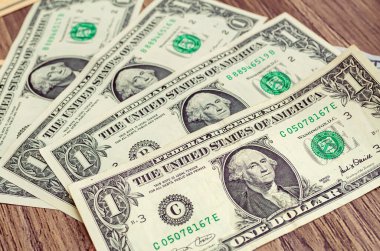 Money, US dollar banknotes background. One dollar banknotes in close-up. Photography for Finance and Economy concept.