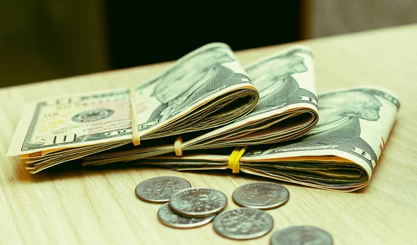 Folded Dollar Bills Wooden Desk Coins — Fotografia de Stock