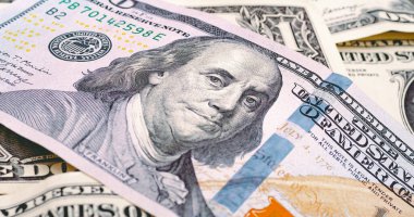 United States dollar banknotes in macro photography. Economy and finance concept.