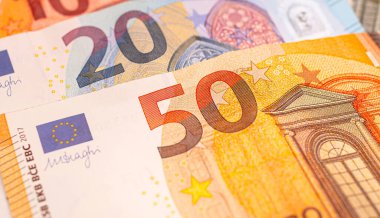 Money, Euro - EUR. Euro banknotes in close-up. Finance, economy, income and investments concept.