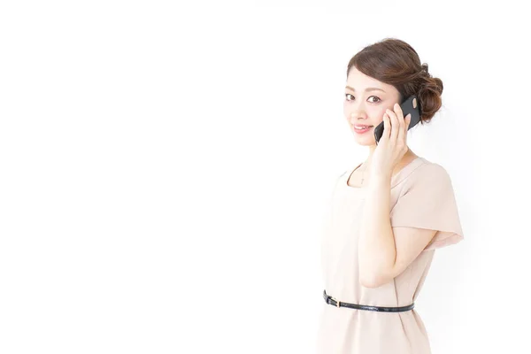 Vrouw Jurk Met Behulp Van Een Smartphone Poseren Geïsoleerd Witte — Stockfoto