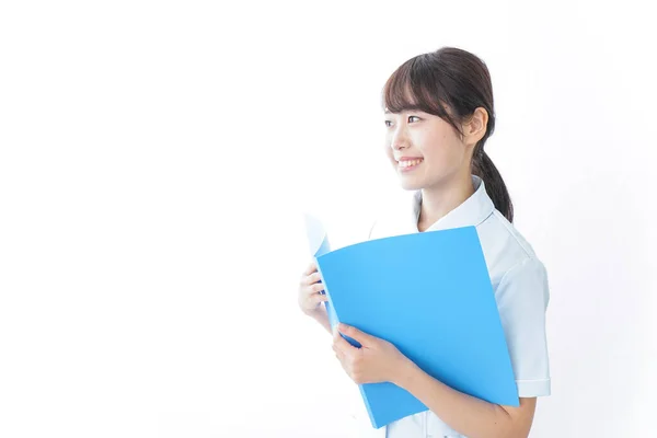 Young Nurse Having Clinical Record — Stock Photo, Image