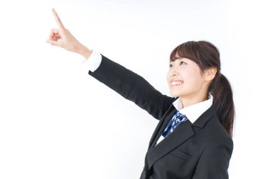 Geleceği gösteren liseli kız.