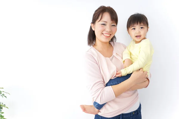 Mother Carrying Child Her Arms — Stock Photo, Image