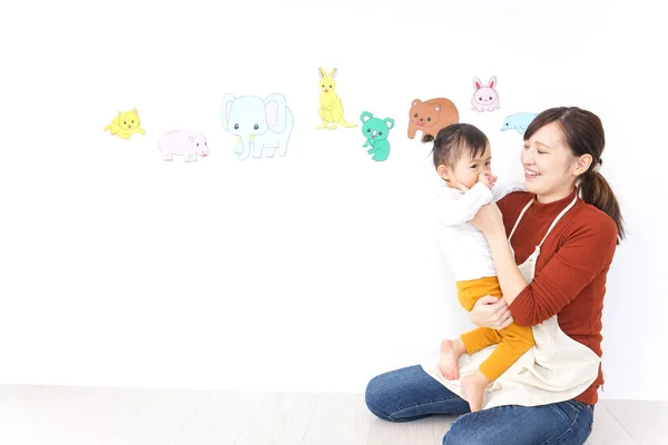 Nursery Teacher Care Child Having Cold — Stock Photo, Image