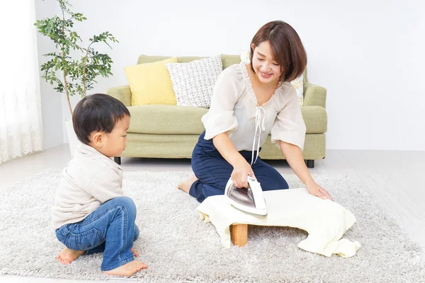 Mother Doing Household Chores Child — Stock Photo, Image