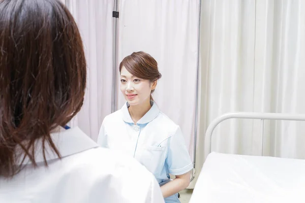 Female Doctor Nurse Doing Meeting — Stock Photo, Image