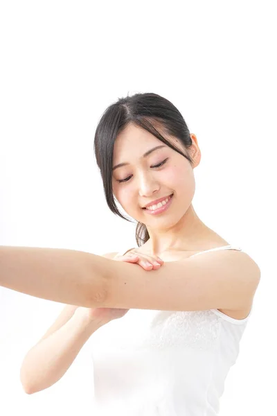 Young Woman Applying Cream — Stock Photo, Image