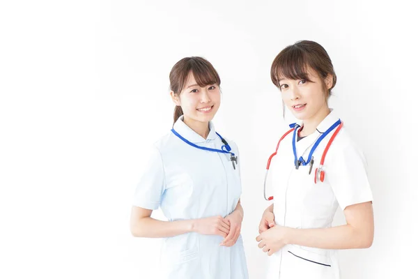 Två Unga Asiatiska Sjuksköterskor — Stockfoto