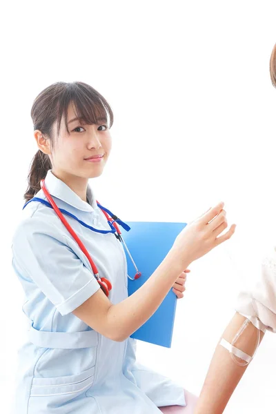 Nurse Putting Woman Drip — Stock Photo, Image