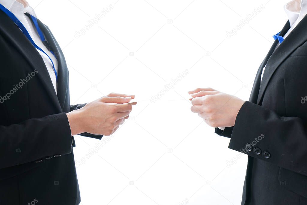 Businesspeople exchanging business cards