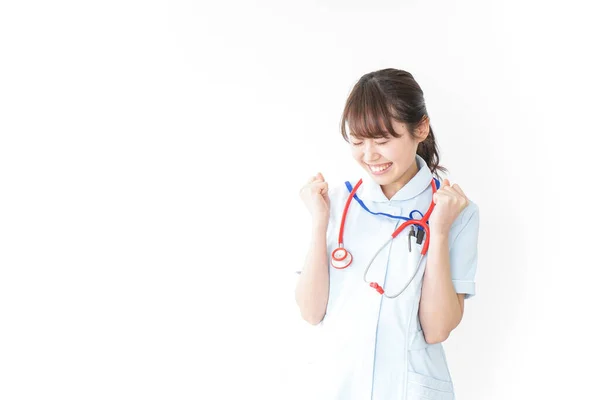 Verpleegster Pompen Haar Vuisten Geïsoleerd Wit — Stockfoto