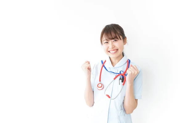 Verpleegster Pompen Haar Vuisten Geïsoleerd Wit — Stockfoto