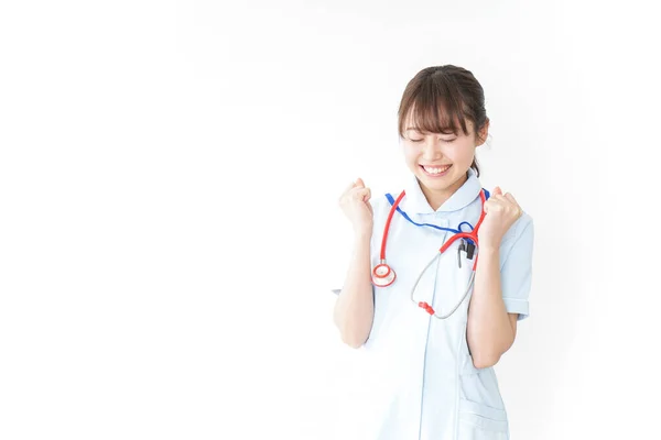 Verpleegster Pompen Haar Vuisten Geïsoleerd Wit — Stockfoto