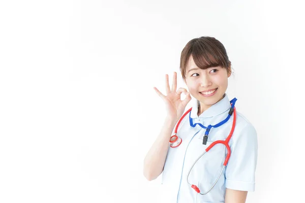 Nurse Giving Sign Isolated White — Stock Photo, Image