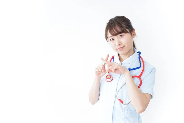Joven Enfermera Dando Ninguna Señal —  Fotos de Stock