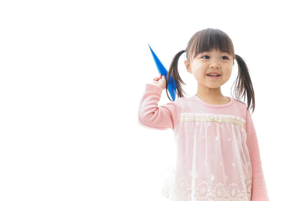 Little Girl Holding Paper Plane — Stock Photo, Image