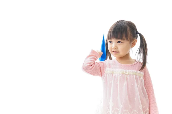 Little Girl Holding Paper Plane — Stock Photo, Image