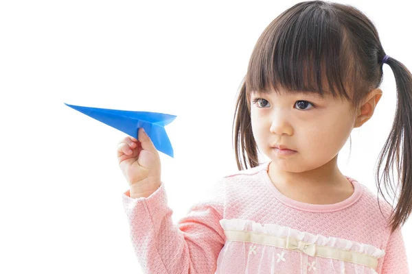 Little Girl Holding Paper Plane — Stock Photo, Image