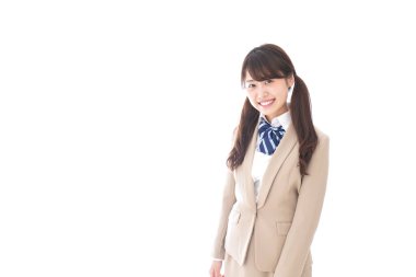 Beyaz arka planda izole bir şekilde gülümseyen lise öğrencisi 