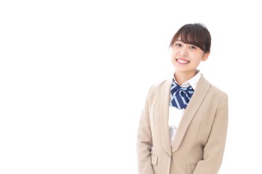 Gülümseyen Asyalı bir kız öğrenci. 