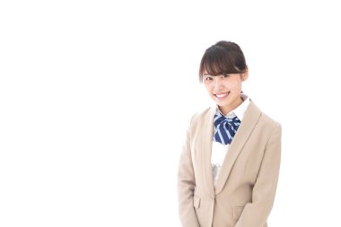 Gülümseyen Asyalı bir kız öğrenci. 