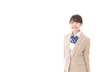 Gülümseyen Asyalı bir kız öğrenci. 