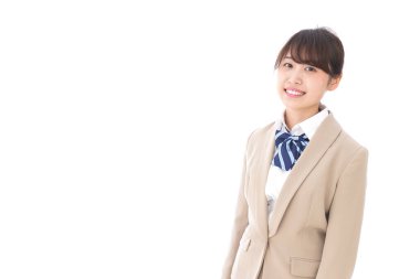 Gülümseyen Asyalı bir kız öğrenci. 