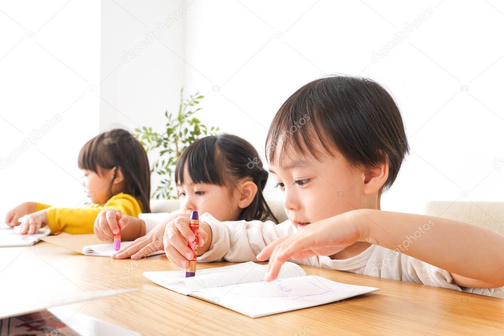 children studying in class  