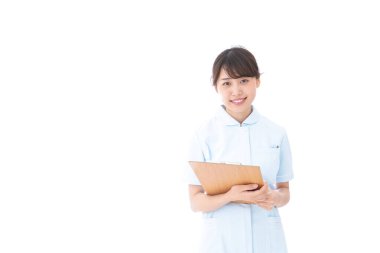 Genç hemşire beyaz arka planda, genç hemşire imajı