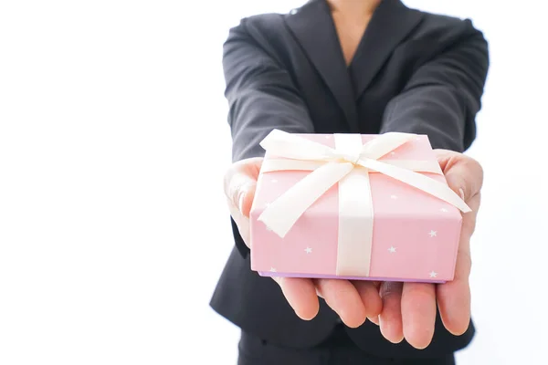 Young Woman Suit Holding Gift Box White Background — Stock Photo, Image