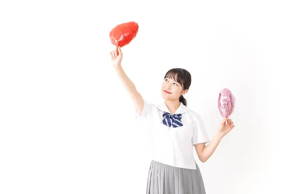 Junge Frau Mit Herzförmigen Luftballons Auf Weißem Hintergrund — Stockfoto