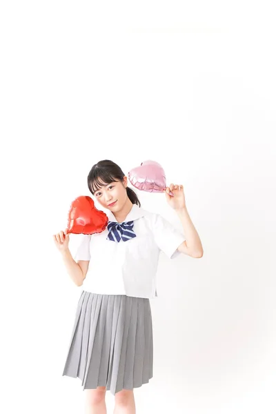 Jonge Vrouw Met Hartvormige Luchtballonnen Witte Achtergrond — Stockfoto