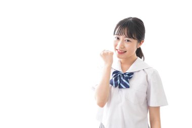 Üniformalı gülümseyen Asyalı kız öğrenci 