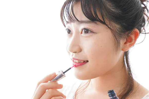 Mujer Joven Haciendo Maquillaje —  Fotos de Stock