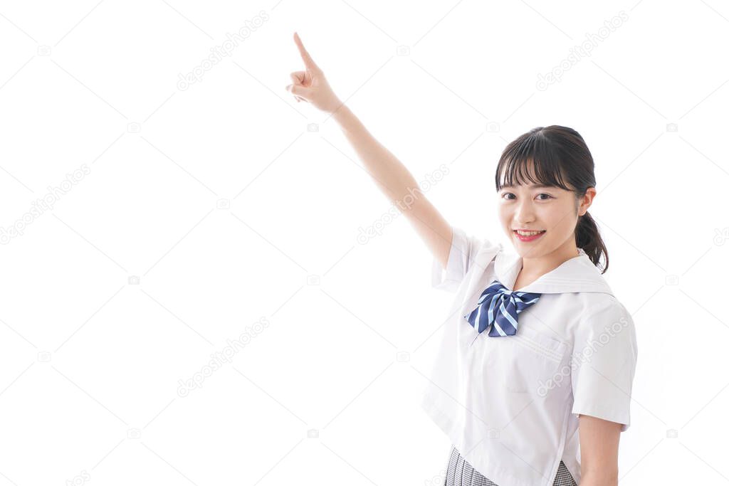 Student pointing with smile