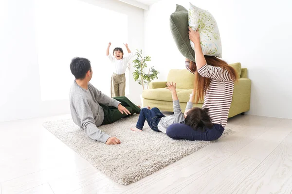 Happy Young Family Playing Home — Stock Photo, Image