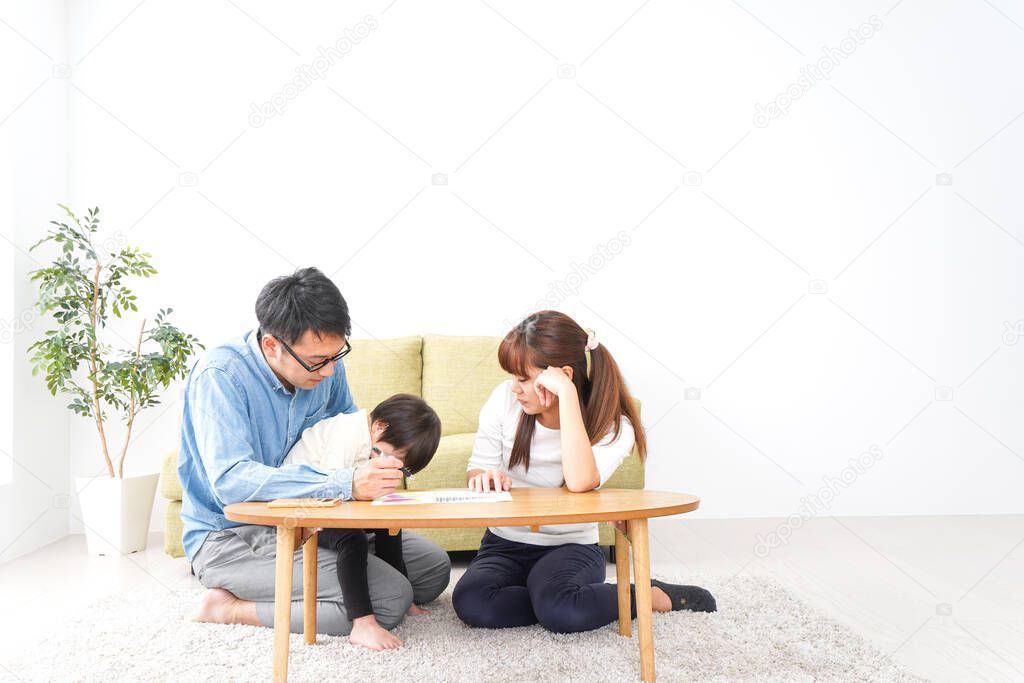 Young couple with child at family meeting