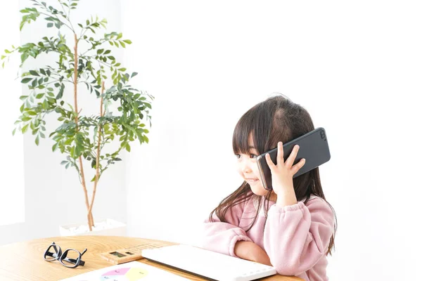 Little Asian Girl Using Telephone — Stock Photo, Image