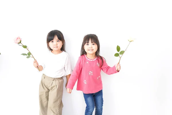 Little Girls Posing Flowers Isolated White Background — Stock Photo, Image