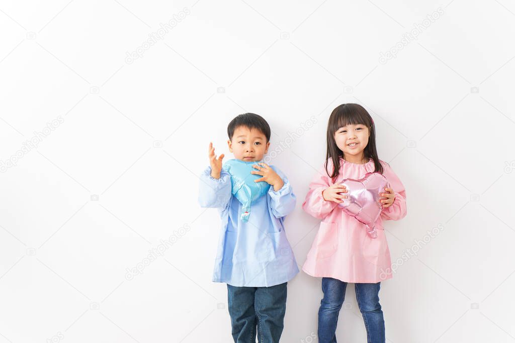 Girl and boy playing at home