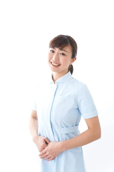 Young Nurse Giving Bow — Stock Photo, Image