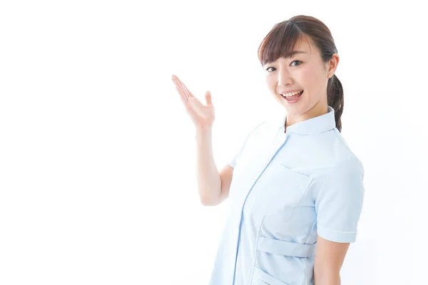 Young Nurse Pointing Something — Stock Photo, Image